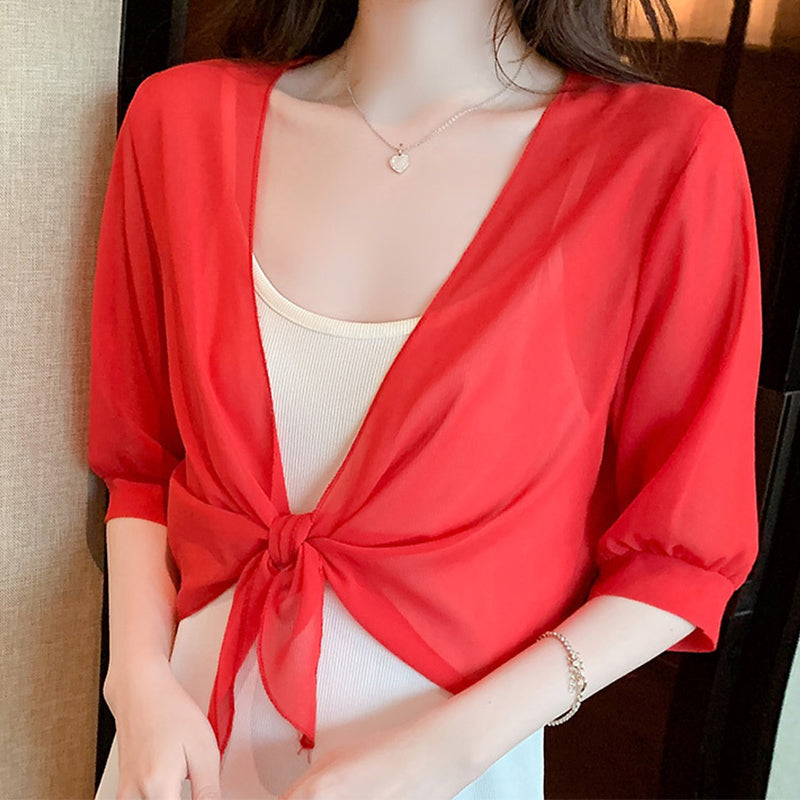 Haut femme en chiffon transparent avec nœud à l’avant