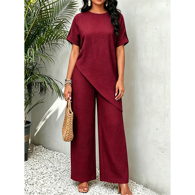 Ensemble femme avec haut asymétrique et pantalon large fluide